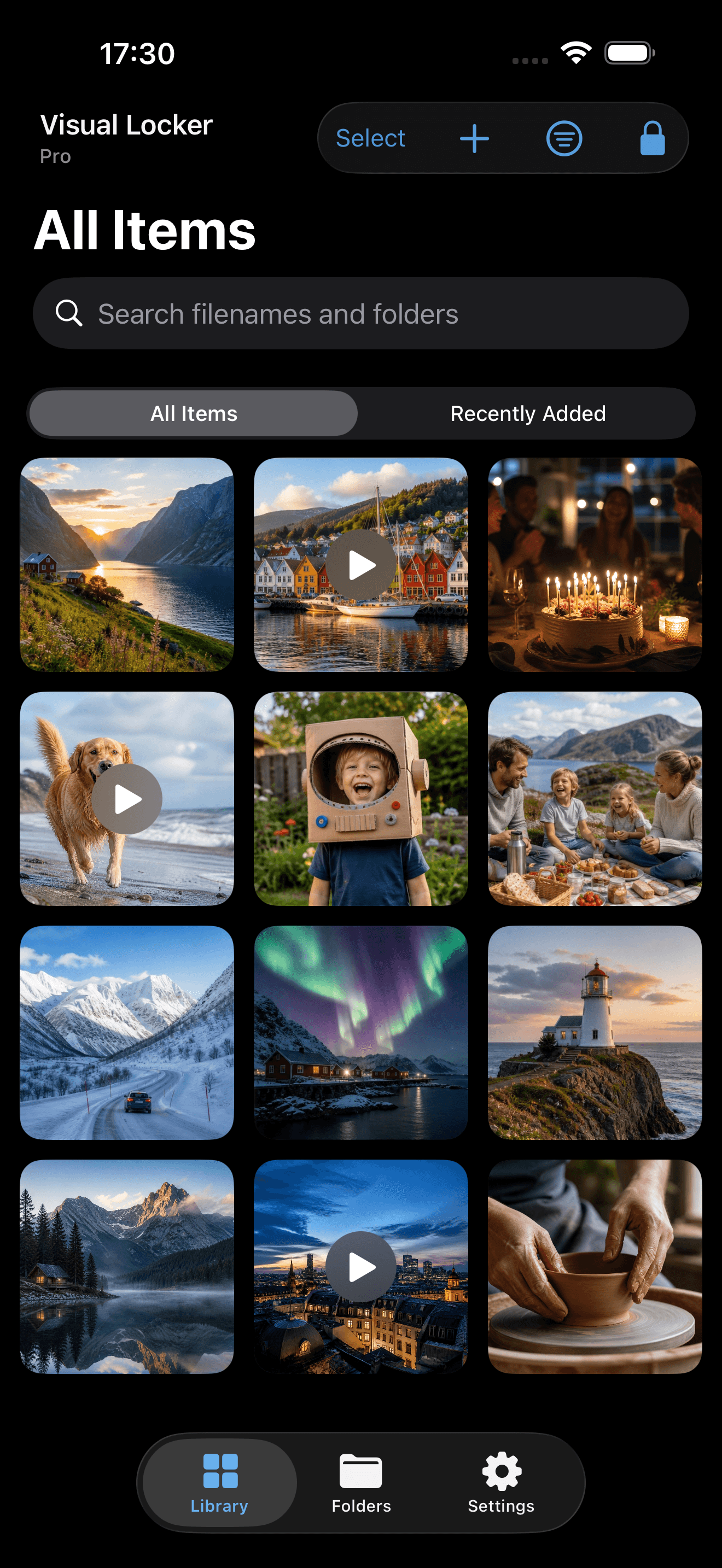 Visual Locker on iPhone showing a private library of sample photos and videos.